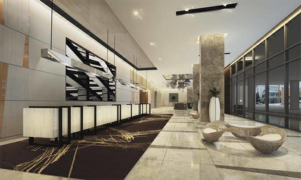 Seda Vertis North Кесон-Сити Экстерьер фото The lobby of the hotel
